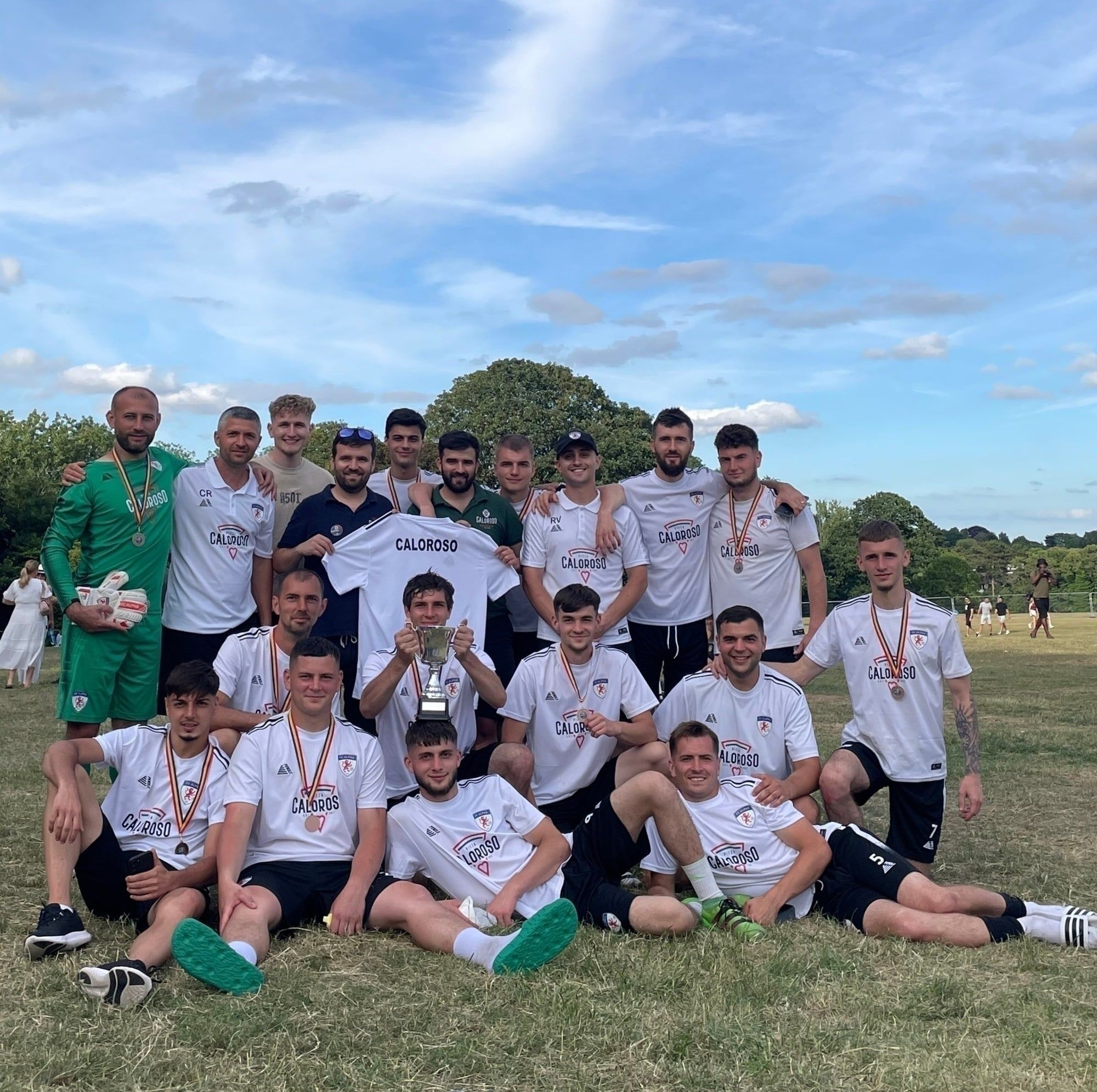 The FC Alpha senior team with their medals after finishing third at Diaspora Fest