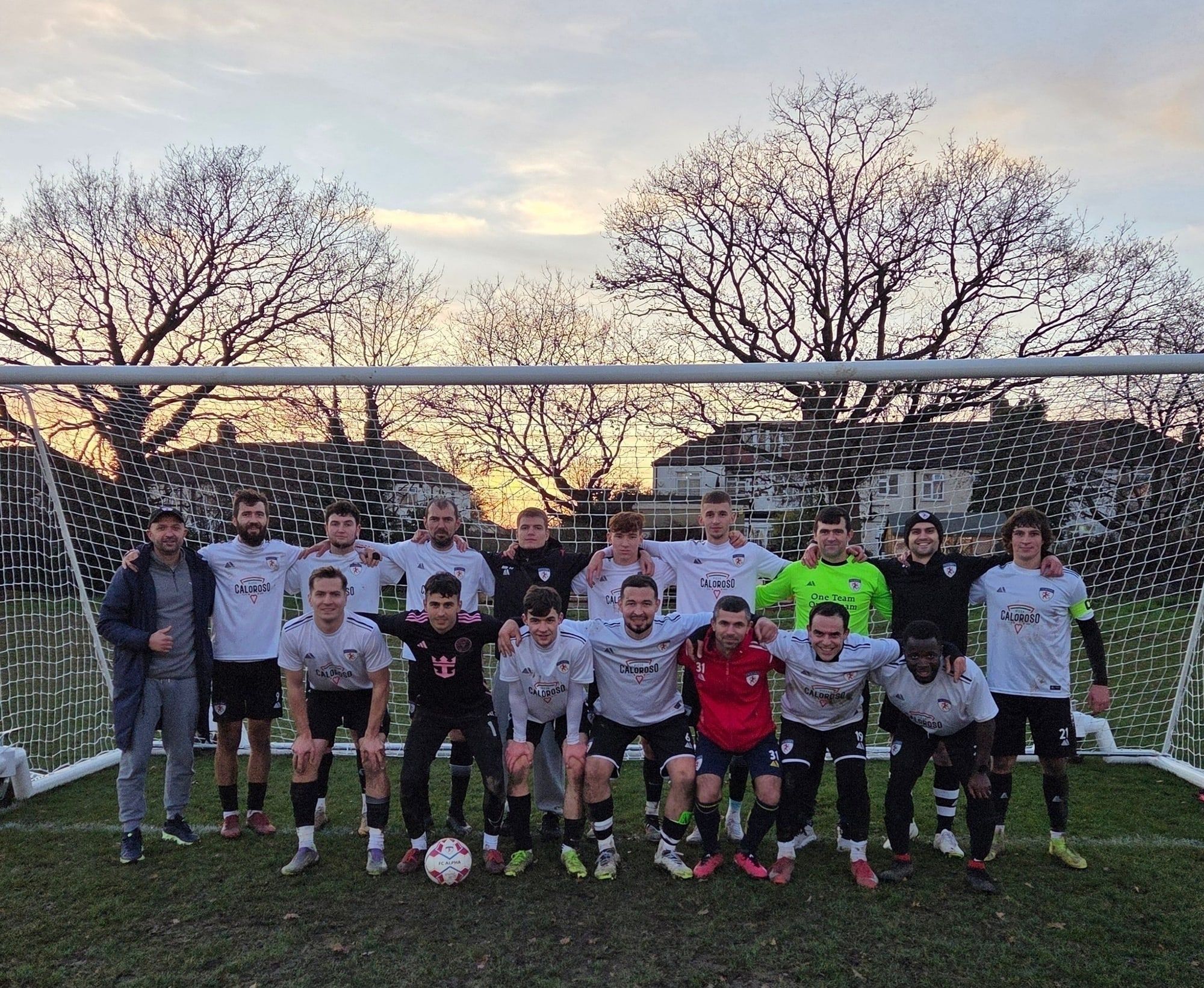 FC Alpha players and their opponents after a December match