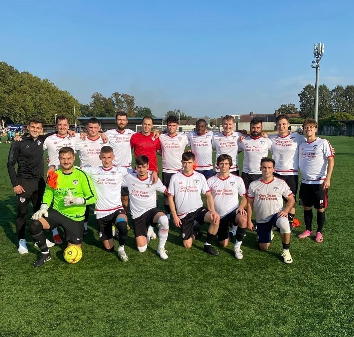The FC Alpha senior team in white after a win
