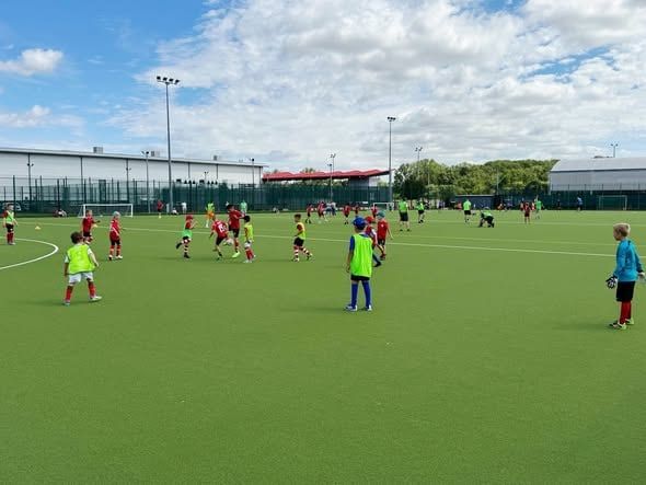 Children and families at the FC Alpha Academy season finale