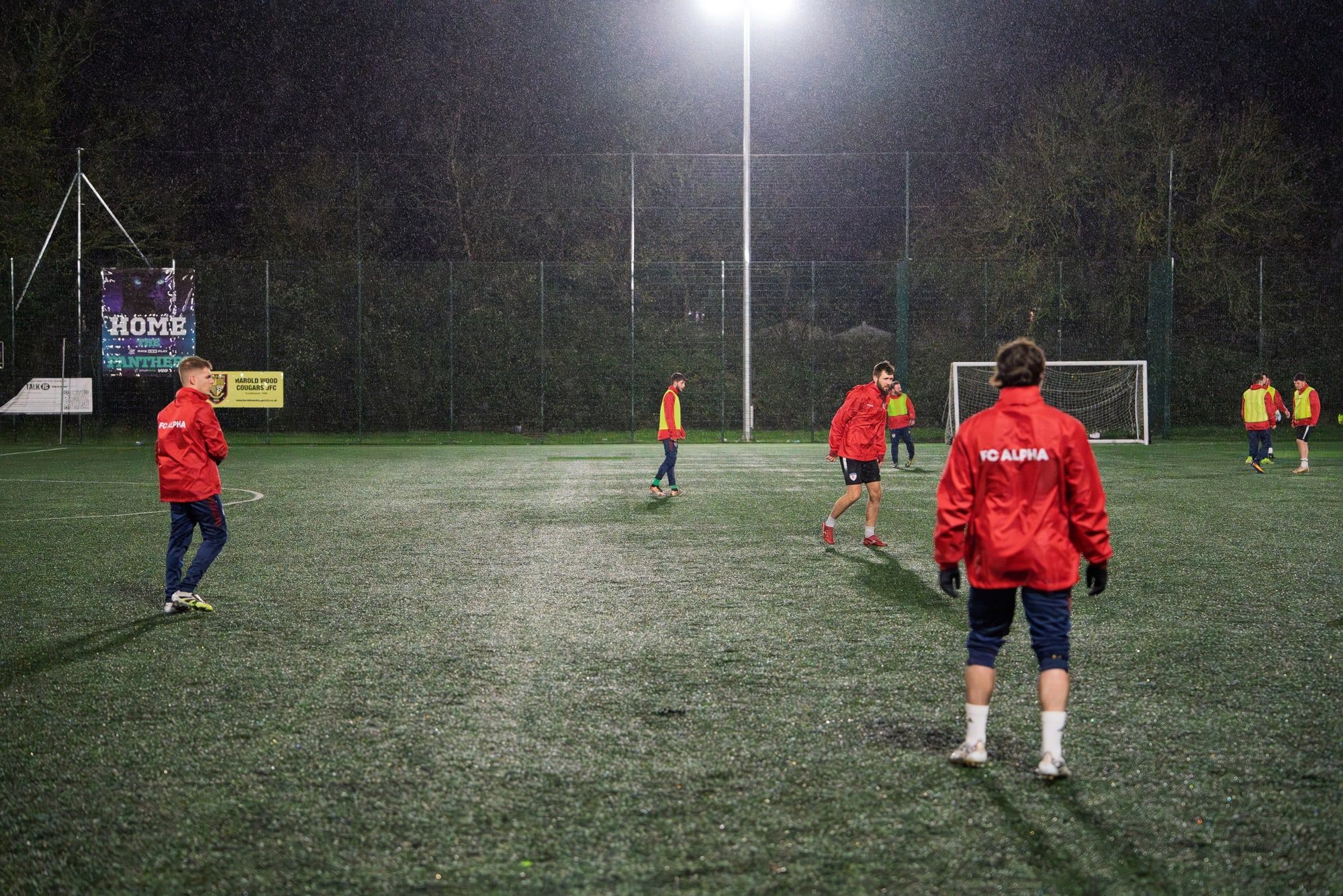 The senior team training on a wet night at Noak Hill