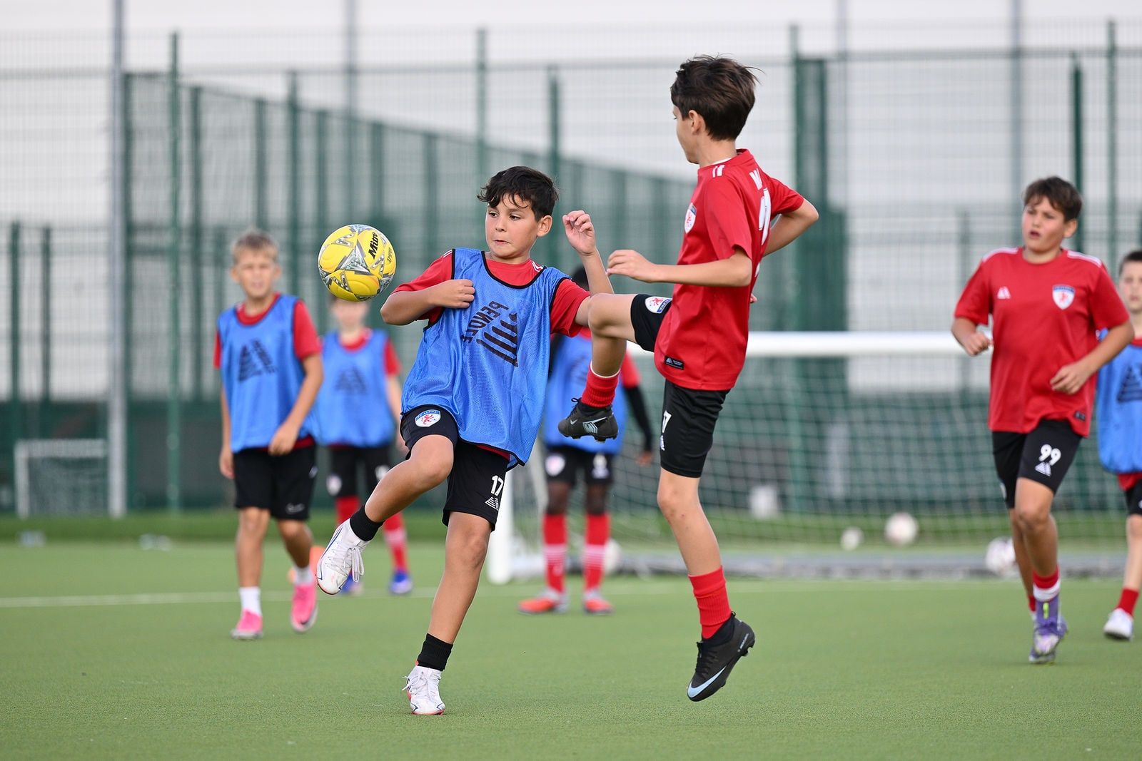 Under 10 & 11 players in a match drill at FC Alpha Academy, Basildon