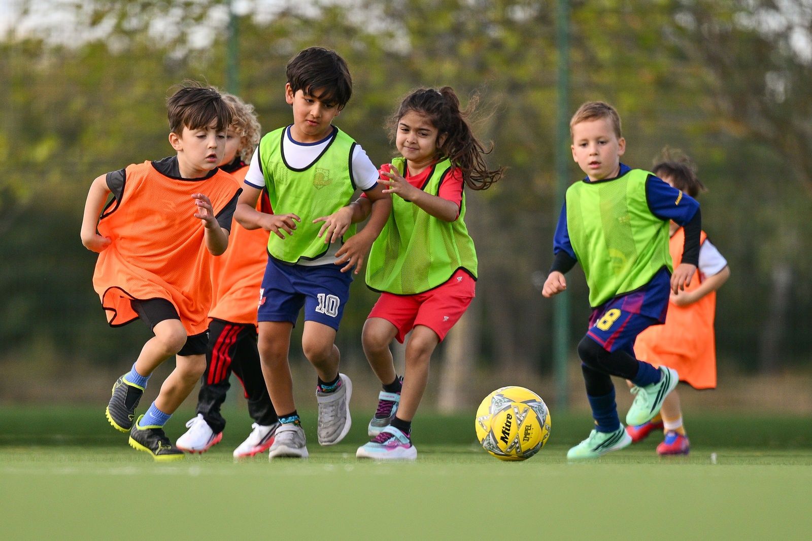 Under 6 children playing football at FC Alpha Academy, Basildon